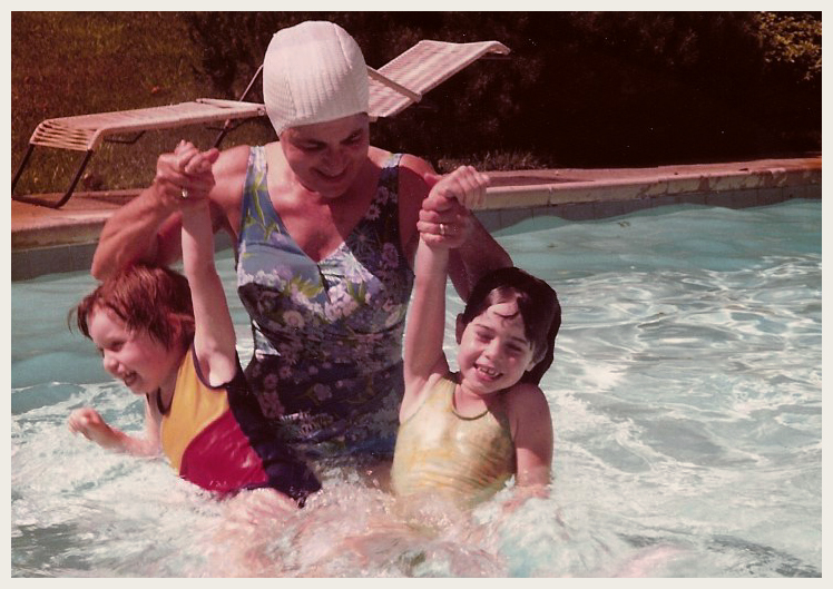 grandmother playing with the author, her granddaughter, in a swimming pool - an example of including grandparents in family photos.